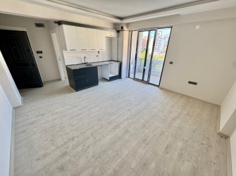 SAMSUN ATAKUM KÖRFEZ MH. 1+1 55 M2 5. KAT YERDEN ISITMALI SOĞUKSU BULVARINA CEPHE İSKANI ALINMIŞ KREDİYE UYGUN FIRSAT DAİRE..