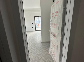 SAMSUN ATAKUM ÇAKIRLAR YALI MAH 1+1 4.KAT GENİŞ BALKONLU SIFIR 60m2 İSKANLI ÇİFT ASANSÖRLÜ DAİRE 