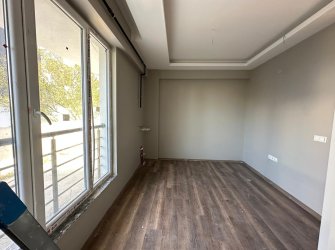 SAMSUN ATAKUM ÇAKIRLAR YALI MAH. 1+1 SIFIR YERDEN ISITMALI GİRİŞ KAT