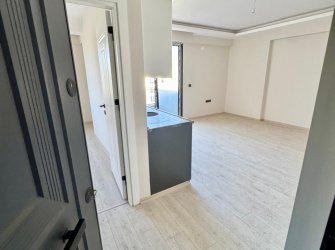 SAMSUN ATAKUM KÖRFEZ MH. 1+1 55 M2 5. KAT YERDEN ISITMALI SOĞUKSU BULVARINA CEPHE İSKANI ALINMIŞ KREDİYE UYGUN FIRSAT DAİRE..