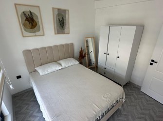 SAMSUN ATAKUM ÇAKIRLAR MAH 1+1 YÜKSEK GİRİŞ 50m2 EŞYALI KREDİYE UYGUN KOMBİ TAKILI OTOPARKLI SIFIR DAİRE