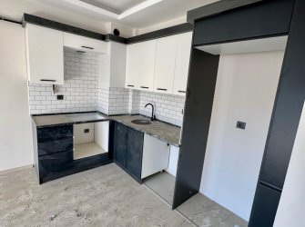 SAMSUN ATAKUM KÖRFEZ MH. 1+1 55 M2 5. KAT YERDEN ISITMALI SOĞUKSU BULVARINA CEPHE İSKANI ALINMIŞ KREDİYE UYGUN FIRSAT DAİRE..