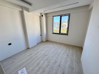 SAMSUN ATAKUM KÖRFEZ MH. 1+1 55 M2 5. KAT YERDEN ISITMALI SOĞUKSU BULVARINA CEPHE İSKANI ALINMIŞ KREDİYE UYGUN FIRSAT DAİRE..