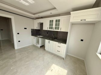 SAMSUN İLKADIM KIŞLA MH 3+1 140m2 1.KAT EBEVEYN BANYOLU 2 BALKONLU YERDEN ISITMALI KREDİYE UYGUN SIFIR KUPON DAİRE