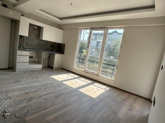 SAMSUN CANİK HASKÖY MAH 3.KAT 1+1 60m2 GENİŞ BALKONLU KREDİYE UYGUN YERDEN ISITMALI SIFIR KUPON DAİRE.
