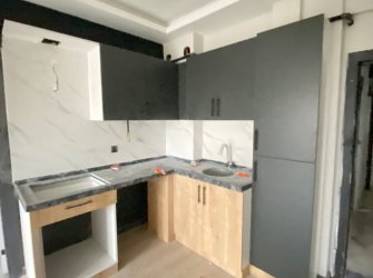 SAMSUN ATAKUM KURUPELİT MH 1+1 1.KAT GENİŞ BALKONLU YERDEN ISITMALI SIFIR FIRSAT DAİRE 