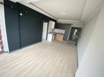 SAMSUN ATAKUM KURUPELİT MH 1+1 1.KAT GENİŞ BALKONLU YERDEN ISITMALI SIFIR FIRSAT DAİRE 