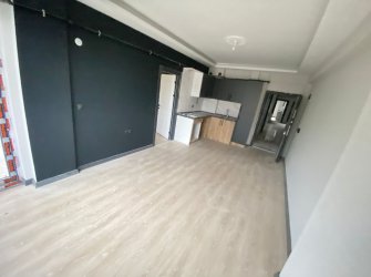 SAMSUN ATAKUM KURUPELİT MH 1+1 1.KAT GENİŞ BALKONLU YERDEN ISITMALI SIFIR FIRSAT DAİRE 
