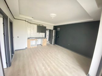 SAMSUN ATAKUM KURUPELİT MH 1+1 5.KAT 60m2 YERDEN ISITMALI GENİŞ BALKONLU SIFIR FIRSAT DAİRE 