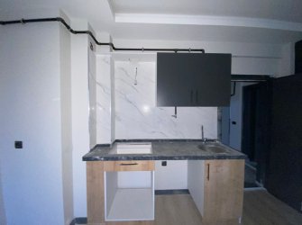 SAMSUN ATAKUM KURUPELİT MH 1+1 5.KAT 60m2 YERDEN ISITMALI GENİŞ BALKONLU SIFIR FIRSAT DAİRE 
