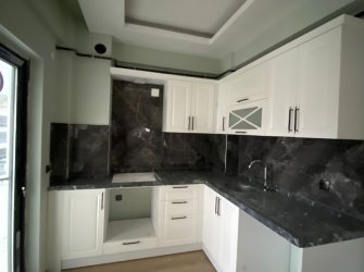 SAMSUN ATAKUM KURUPELİT MH 1+1 5.KAT 55m2 YERDEN ISITMALI ÖZEL YAPIM GENİŞ BALKONLU SIFIR FIRSAT DAİRE