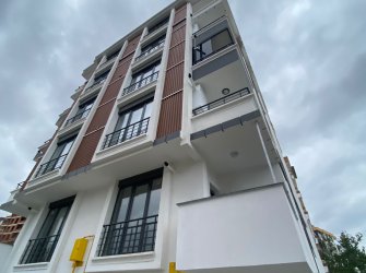 SAMSUN ATAKUM KURUPELİT MH 1+1 5.KAT 55m2 YERDEN ISITMALI ÖZEL YAPIM GENİŞ BALKONLU SIFIR FIRSAT DAİRE 