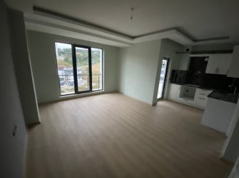 SAMSUN ATAKUM KURUPELİT MH 1+1 5.KAT 55m2 YERDEN ISITMALI ÖZEL YAPIM GENİŞ BALKONLU SIFIR FIRSAT DAİRE 