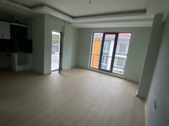 SAMSUN ATAKUM KURUPELİT MH 1+1 5.KAT 55m2 YERDEN ISITMALI ÖZEL YAPIM GENİŞ BALKONLU SIFIR FIRSAT DAİRE 