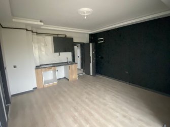 SAMSUN ATAKUM KURUPELİT MH 1+1 5.KAT 60m2 YERDEN ISITMALI GENİŞ BALKONLU SIFIR FIRSAT DAİRE 