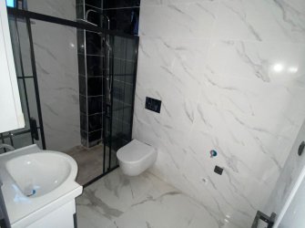 SAMSUN ATAKUM KURUPELİT MH 1+1 1.KAT GENİŞ BALKONLU YERDEN ISITMALI SIFIR FIRSAT DAİRE 