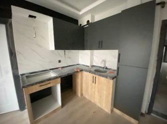 SAMSUN ATAKUM KURUPELİT MH 1+1 1.KAT GENİŞ BALKONLU YERDEN ISITMALI SIFIR FIRSAT DAİRE 