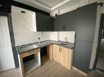 SAMSUN ATAKUM KURUPELİT MH 1+1 1.KAT GENİŞ BALKONLU YERDEN ISITMALI SIFIR FIRSAT DAİRE 