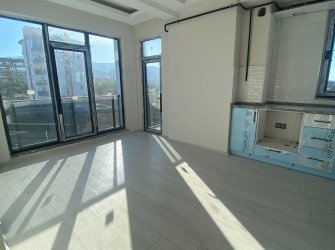 SAMSUN ATAKUM KURUPELİT MAH 2.KAT 1+1 YERDEN ISITMALI DENİZ VE DOĞA MANZARALI 55m2 SIFIR DAİRE 
