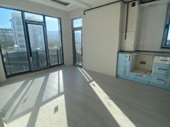 SAMSUN ATAKUM KURUPELİT MAH 2.KAT 1+1 YERDEN ISITMALI DENİZ VE DOĞA MANZARALI 55m2 SIFIR DAİRE 