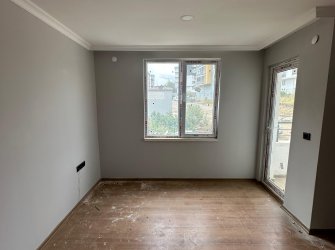 SAMSUN ATAKUM KURUPELİT MAH 1.KAT 85m2 BALKONLU OTOPARKLI SIFIR 2+1 KUPON LOFT DAİRE 