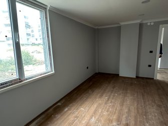 SAMSUN ATAKUM KURUPELİT MAH 1.KAT 85m2 BALKONLU OTOPARKLI SIFIR 2+1 KUPON LOFT DAİRE 