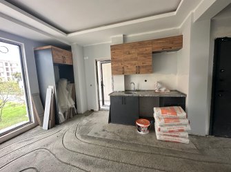 SAMSUN ATAKUM ÇAKIRLAR MAH 1+1 55m2 1.KAT YERDEN ISITMALI 1 BALKON OTOPARKLI KREDİYE UYGUN SIFIR DAİRE 