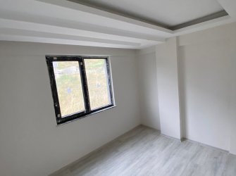 SAMSUN ATAKUM KURUPELİT MAH 1+1 50m2 1.KAT BALKONLU YERDEN ISITMALI OTOPARKLI ASANSÖRLÜ SIFIR DAİRE 