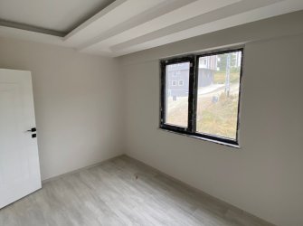 SAMSUN ATAKUM KURUPELİT MAH 1+1 50m2 1.KAT BALKONLU YERDEN ISITMALI OTOPARKLI ASANSÖRLÜ SIFIR DAİRE 