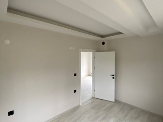 SAMSUN ATAKUM KURUPELİT MAH 1+1 50m2 1.KAT BALKONLU YERDEN ISITMALI OTOPARKLI ASANSÖRLÜ SIFIR DAİRE 