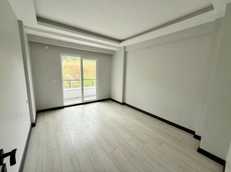 SAMSUN ATAKUM KÜÇÜKKOLPINAR MH 2+1 90m2 4.KAT DENİZ VE ŞEHİR MANZARALI 2 BALKONLU VESTİYERLİ YERDEN ISITMALI KREDİYE UYGUN SATILIK LÜX DAİRE