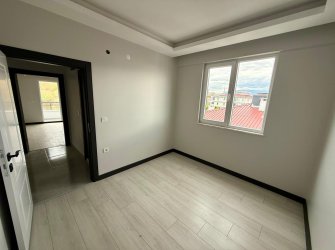 SAMSUN ATAKUM KÜÇÜKKOLPINAR MH 2+1 90m2 4.KAT DENİZ VE ŞEHİR MANZARALI 2 BALKONLU VESTİYERLİ YERDEN ISITMALI KREDİYE UYGUN SATILIK LÜX DAİRE