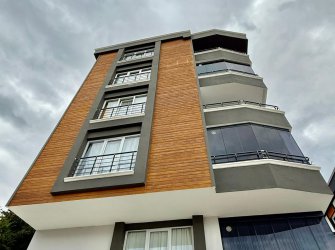 SAMSUN ATAKUM KÜÇÜKKOLPINAR MH 2+1 90m2 4.KAT DENİZ VE ŞEHİR MANZARALI 2 BALKONLU VESTİYERLİ YERDEN ISITMALI KREDİYE UYGUN SATILIK LÜX DAİRE