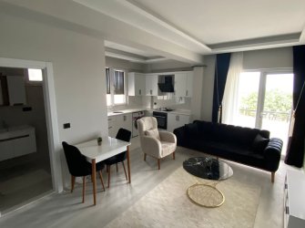 SAMSUN ATAKUM KURUPELİT MH 1+1 YÜKSEK GİRİŞ BALKONLU OTOPARKLI ÖZEL YAPIM EŞYALI FIRSAT DAİRE