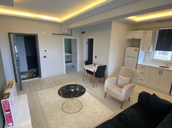 SAMSUN ATAKUM KURUPELİT MH 1+1 YÜKSEK GİRİŞ BALKONLU OTOPARKLI ÖZEL YAPIM EŞYALI FIRSAT DAİRE