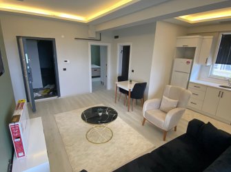 SAMSUN ATAKUM KURUPELİT MH 1+1 YÜKSEK GİRİŞ BALKONLU OTOPARKLI ÖZEL YAPIM EŞYALI FIRSAT DAİRE