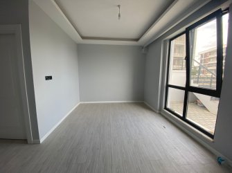 SAMSUN ATAKUM KURUPELİT MH 1+1 50m2 YÜKSEK GİRİŞ CAM BALKONLU YERDEN ISITMALI OTOPARKLI SIFIR FIRSAT DAİRE