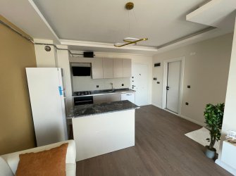 SAMSUN ATAKUM YENİMAHALLE MAH 1+1 50m2 YERDEN ISITMALI SIFIR EŞYALI GENİŞ BALKONLU SON 3 DAİRE