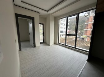 SAMSUN ATAKUM ÇAKIRLAR YALI MAH 1+1 1.KAT 50m2 GENİŞ BALKONLU OTOPARKLI ASANSÖRLÜ YERDEN ISITMALI SIFIR DAİRE