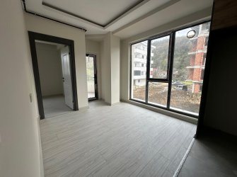 SAMSUN ATAKUM ÇAKIRLAR YALI MAH 1+1 1.KAT 50m2 GENİŞ BALKONLU OTOPARKLI ASANSÖRLÜ YERDEN ISITMALI SIFIR DAİRE