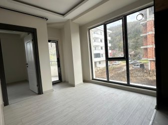 SAMSUN ATAKUM ÇAKIRLAR YALI MAH 1+1 1.KAT 50m2 GENİŞ BALKONLU OTOPARKLI ASANSÖRLÜ YERDEN ISITMALI SIFIR DAİRE
