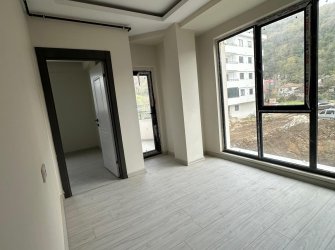 SAMSUN ATAKUM ÇAKIRLAR YALI MAH 1+1 1.KAT 50m2 GENİŞ BALKONLU OTOPARKLI ASANSÖRLÜ YERDEN ISITMALI SIFIR DAİRE