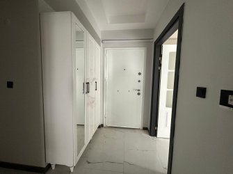 SAMSUN CANİK HASKÖY MAH 2+1 80m2 AMERİKAN MUTFAK BALKONLU OTOPARKLI YERDEN ISITMALI VESTİYER TAKILI YÜKSEK GİRİŞ SIFIR DAİRE