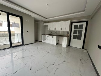 SAMSUN CANİK HASKÖY MAH 2+1 80m2 AMERİKAN MUTFAK BALKONLU OTOPARKLI YERDEN ISITMALI VESTİYER TAKILI YÜKSEK GİRİŞ SIFIR DAİRE