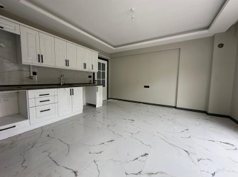 SAMSUN CANİK HASKÖY MAH 2+1 80m2 AMERİKAN MUTFAK BALKONLU OTOPARKLI YERDEN ISITMALI VESTİYER TAKILI YÜKSEK GİRİŞ SIFIR DAİRE
