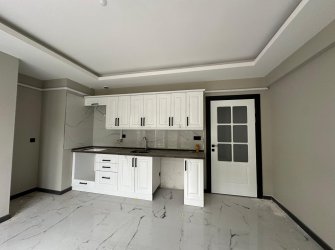 SAMSUN CANİK HASKÖY MAH 2+1 80m2 AMERİKAN MUTFAK BALKONLU OTOPARKLI YERDEN ISITMALI VESTİYER TAKILI YÜKSEK GİRİŞ SIFIR DAİRE
