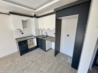 SAMSUN ATAKUM KÖRFEZ MH. 1+1 55 M2 5. KAT YERDEN ISITMALI SOĞUKSU BULVARINA CEPHE İSKANI ALINMIŞ KREDİYE UYGUN FIRSAT DAİRE..