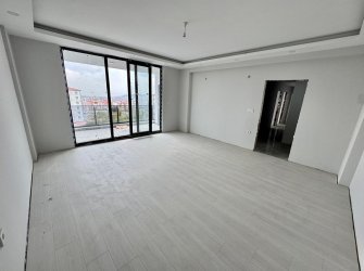 SAMSUN İLKADIM KAVACIK MH. 3+1 2. KAT 130 M2 EBEVEYN BANYOLU YERDEN ISITMALI DENİZ MANZARALI KREDİYE UYGUN FIRSAT DAİRE. 