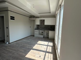 SAMSUN CANİK HASKÖY MAH 3.KAT 1+1 60m2 GENİŞ BALKONLU KREDİYE UYGUN YERDEN ISITMALI SIFIR KUPON DAİRE.