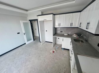 SAMSUN İLKADIM KALKANCI MH. 3+1 1. KAT 130 M2 DENİZ MANZARALI EBEVEYN BANYOLU YERDEN ISITMALI SIFIR FIRSAT DAİRE..